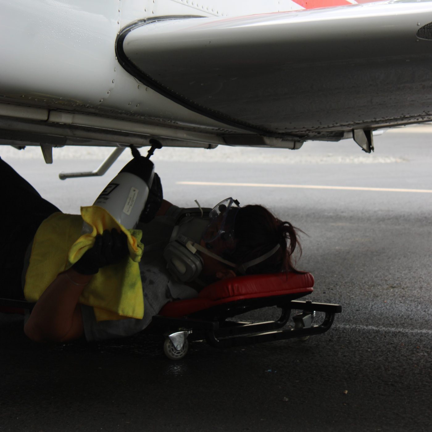 Detailing the underside of an aircraft wing, Olga Detailing Services